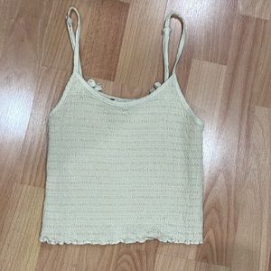 Brandy Melville tan tank top in a size small